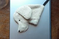Smudge Dog attached to magnetic cover on popular tablet.