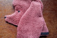 Soft, microfiber terry cloth towels cut, sewn, and made in the shape of a dog