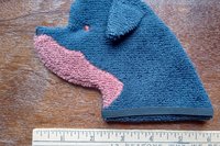 Smudge Dog with ruler to show size.