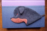 Smudge Dog used as bookmark.