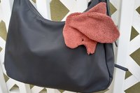 Smudge dog attached to handbag always within reach.