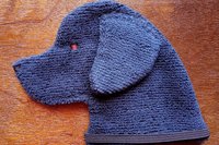 Soft, microfiber terry cloth towels cut, sewn, and made in the shape of a dog
