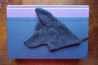 Smudge Dog used as a bookmark.