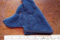 Smudge Dog shown with ruler to show size.