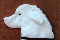 Soft, microfiber terry cloth towels cut, sewn, and made in the shape of the head of an Akbash. Little larger than palm sized. Texture of the Smudge Dog is perfect for cleaning cell phone screens, musical instruments, glasses, etc.