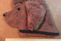 Smudge Dog shown with ruler to illustrate size