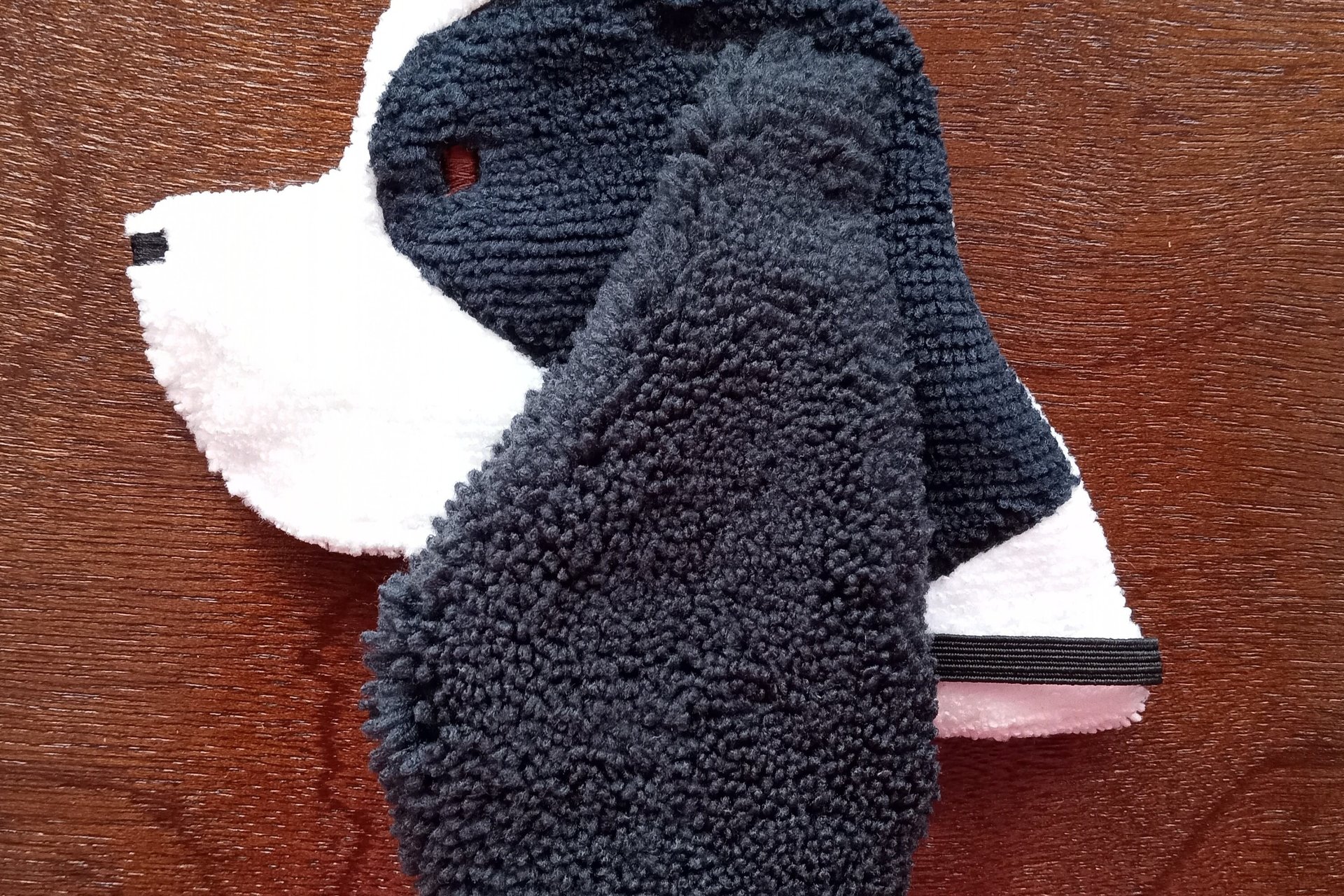 Soft, microfiber terry cloth towels cut, sewn, and made in the shape of a dog