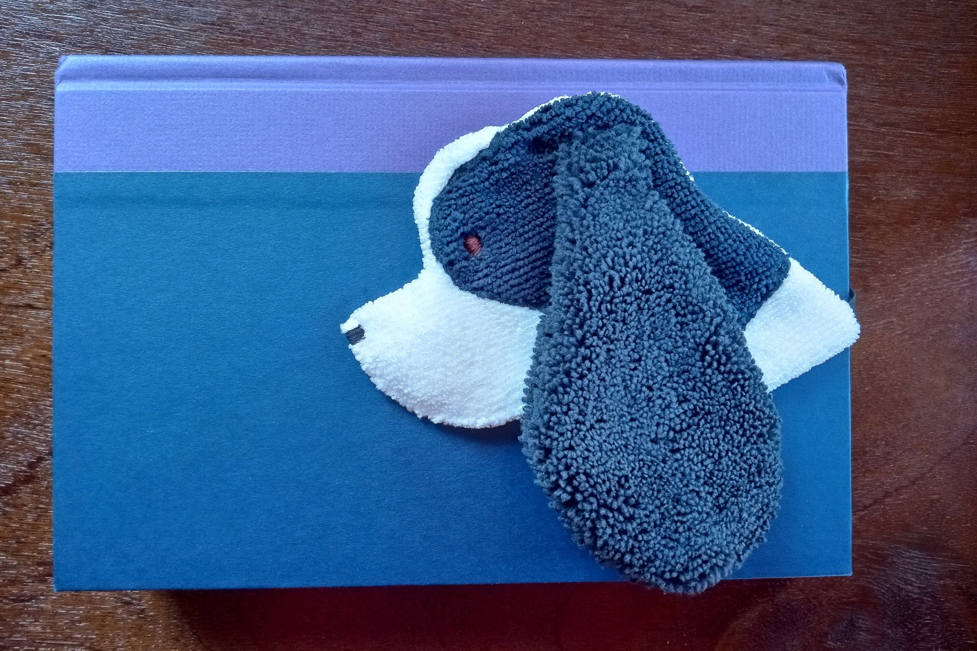 Smudge dog used as a bookmark.