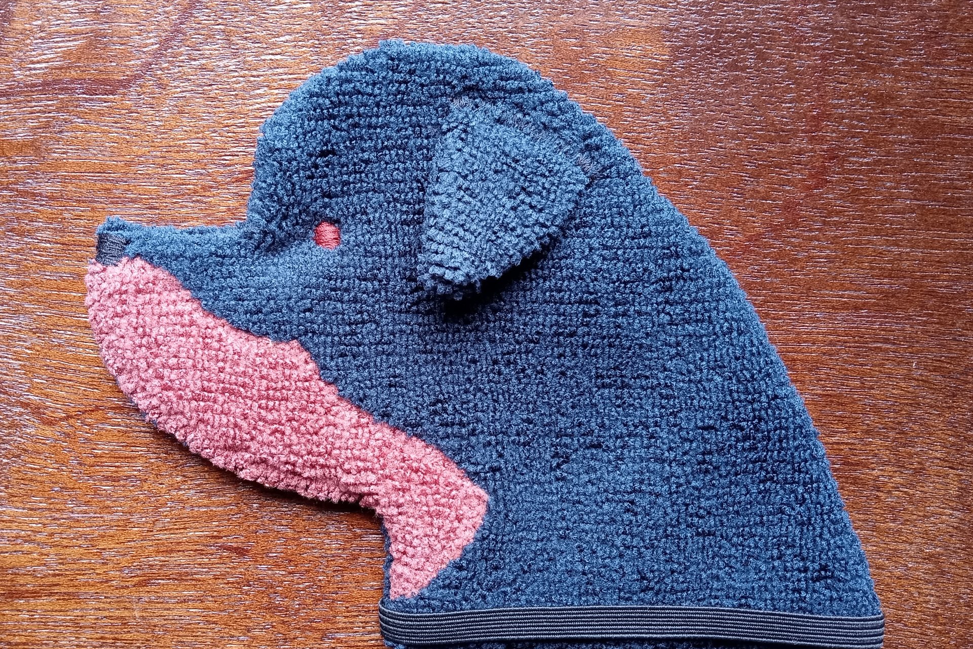Soft, microfiber terry cloth towels cut, sewn, and made in the shape of a dog