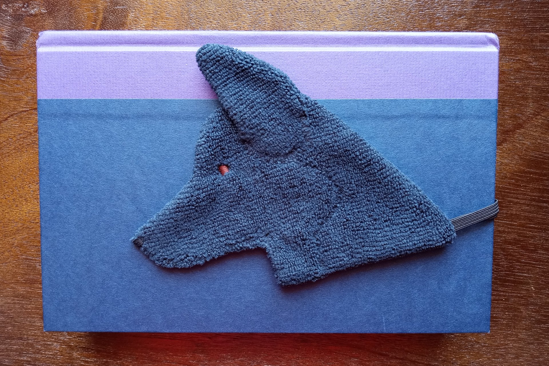 Smudge Dog used as a bookmark.