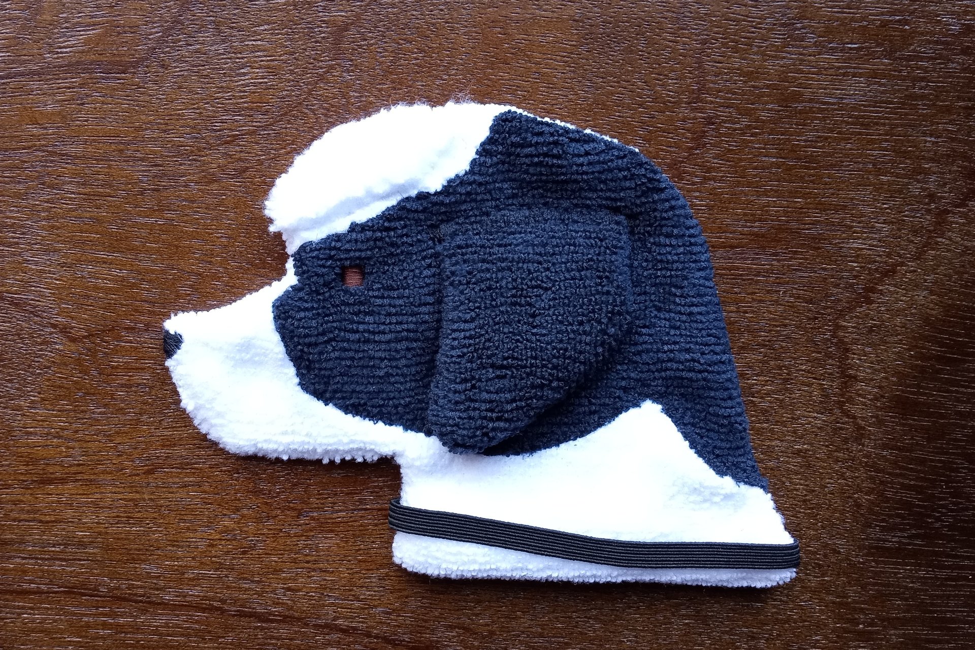 Soft, microfiber terry cloth towels cut, sewn, and made in the shape of a dog