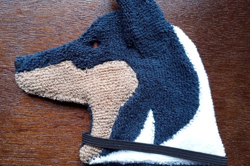 Soft, microfiber terry cloth towels cut, sewn, and made in the shape of a dog