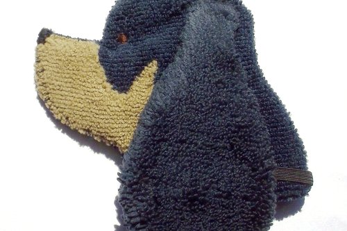Soft, microfiber terry cloth towels cut, sewn, and made in the shape of a dog