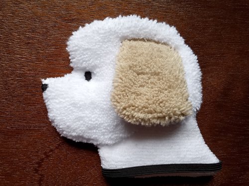Soft, microfiber terry cloth towels cut, sewn, and made in the shape of a dog