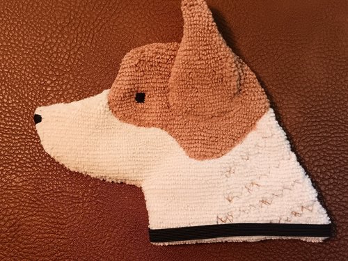 Soft, microfiber terry cloth towels cut, sewn, and made in the shape of the head of a Red Heeler. Little larger than palm sized. Texture of the Smudge Dog is perfect for cleaning cell phone screens, musical instruments, glasses, etc.